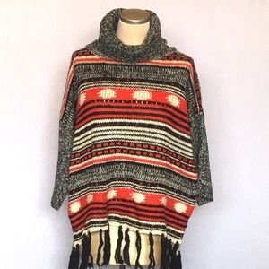 Poncho Turtleneck Fringe Sweater